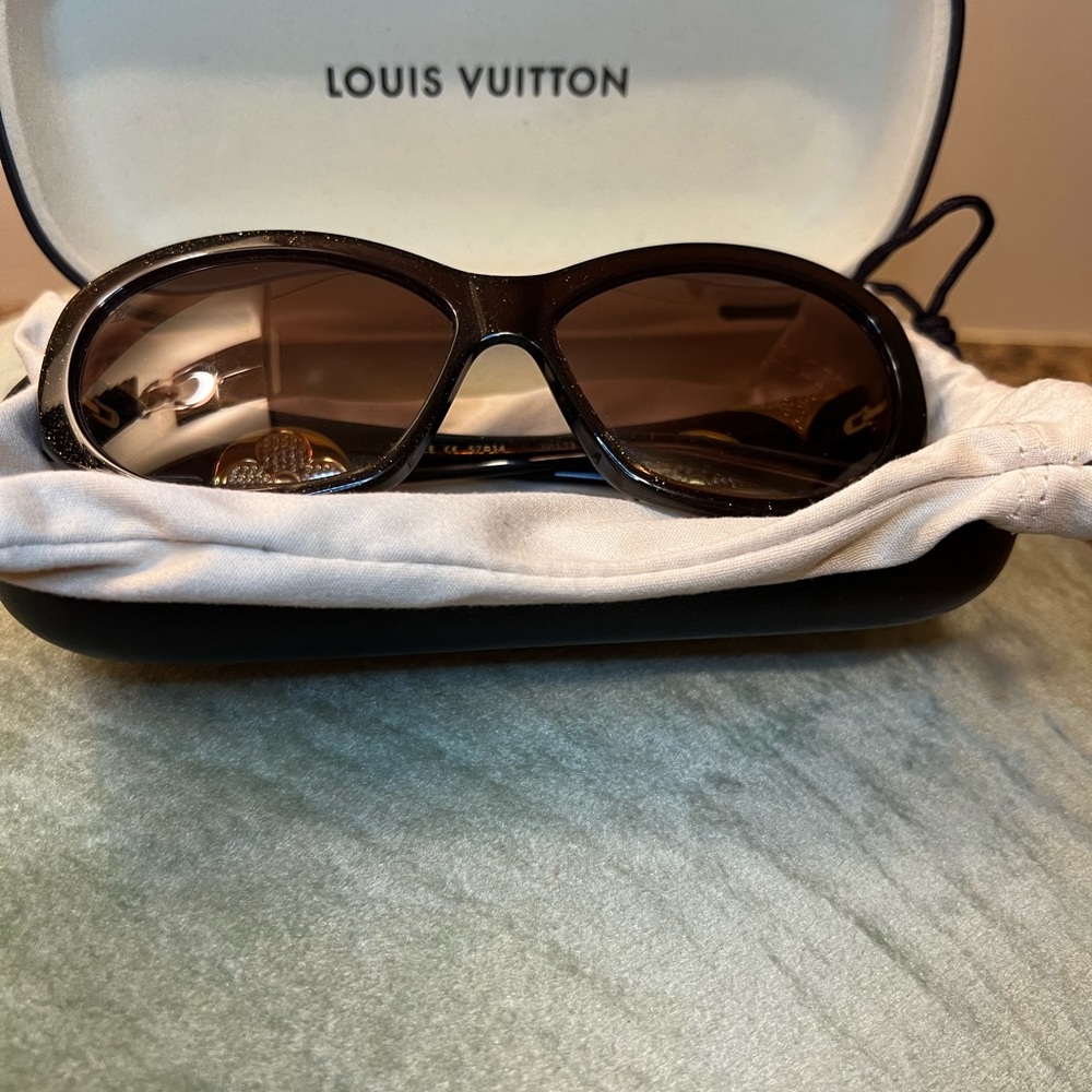Women’s Louis Vuitton Sunglasses.